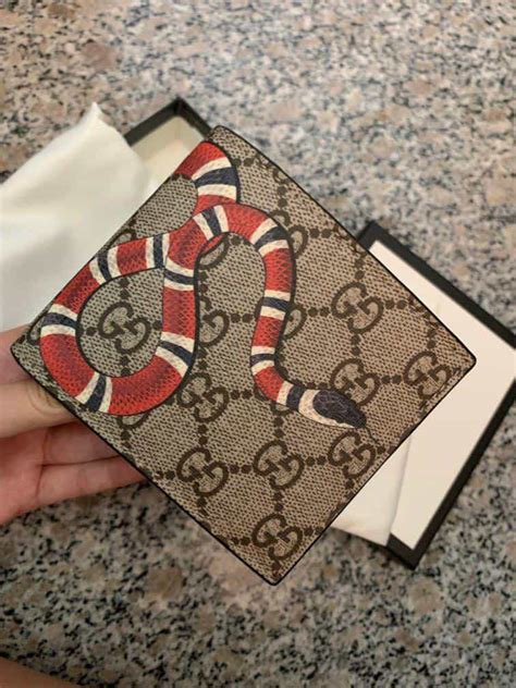 how to tell a fake gucci wallet|authentic gucci snake wallet.